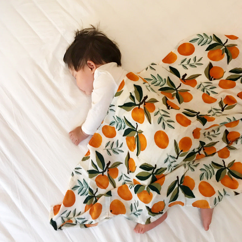 Baby Care holding a blanket towel