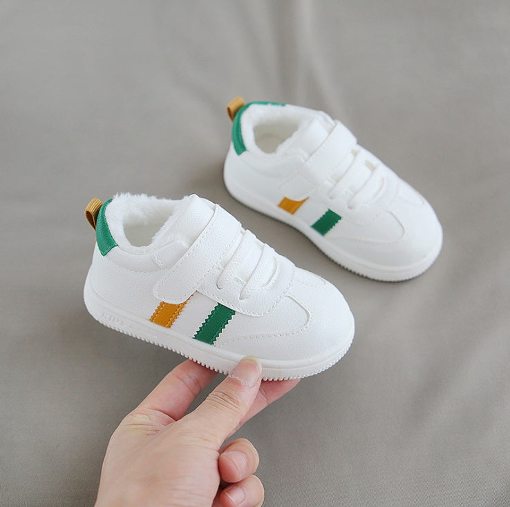 Little white Velcro baby shoes