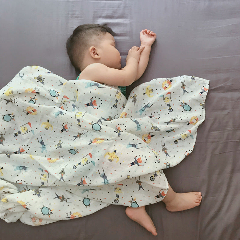 Baby Care holding a blanket towel