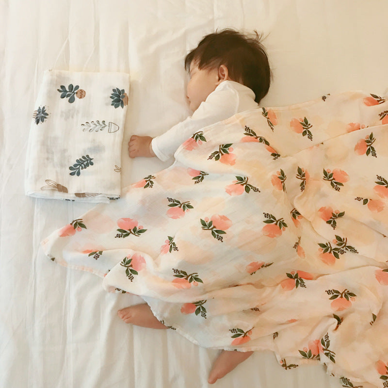 Baby Care holding a blanket towel