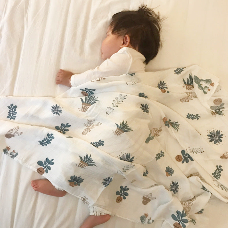 Baby Care holding a blanket towel