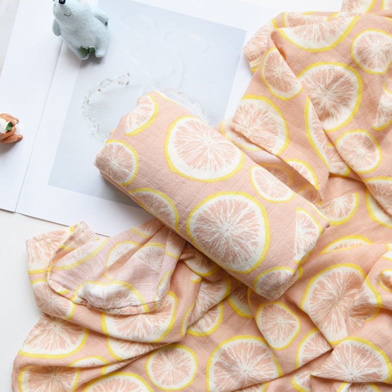 Baby Care holding a blanket towel