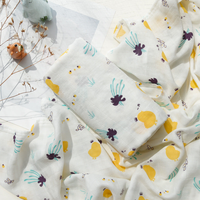 Baby Care holding a blanket towel