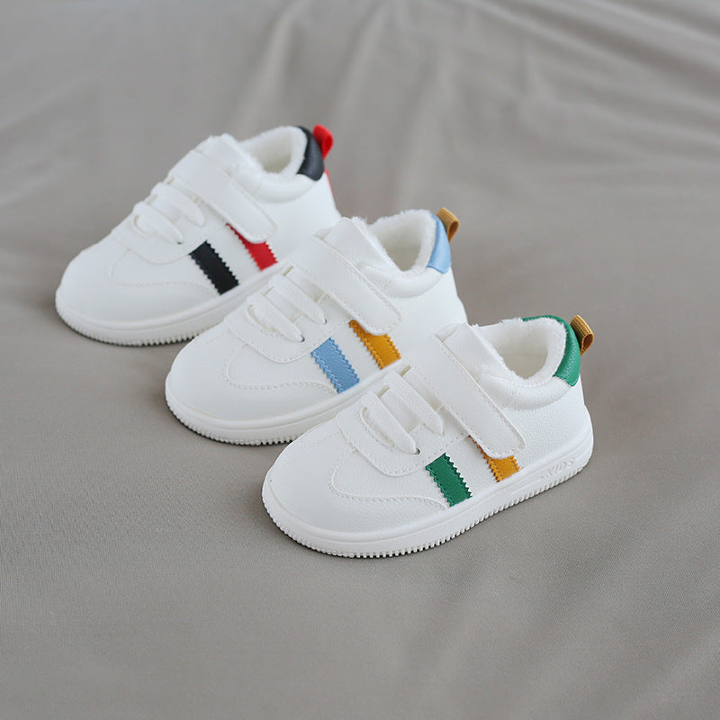 Little white Velcro baby shoes