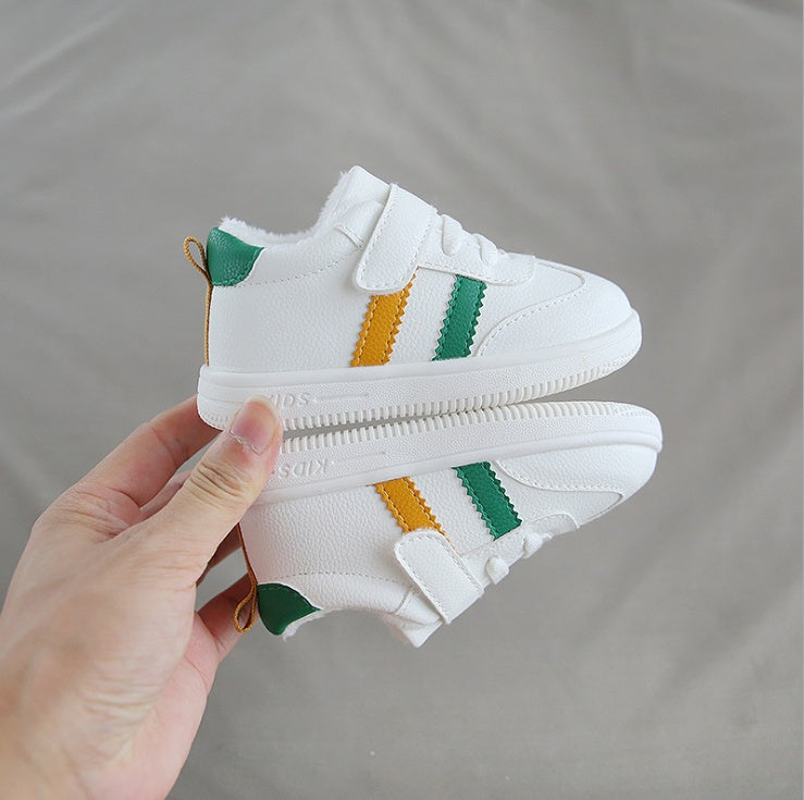 Little white Velcro baby shoes
